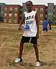 A student learns to throw a frisbee for disc golfing at last year’s NYSP. 