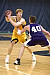 Doug Espenson looks for an open Gustie on the offensive end against St. Thomas.