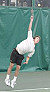 Roy Bryan unloads on a first serve in his singles match.