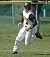 Travis Gunderson rounds third and heads for home in the second inning.