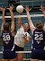 Junior Jami Moseng finds some space to make the kill between two Cornell players