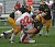 Defensive tackle Nick David teams with Jared Chapman to take down Johnnie running back Mike Lofboom.