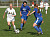 Samantha Engh dribbles in the midst of two Luther defenders.