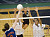 The Gustie front row goes up for a block.