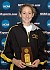 Gustavus junior Hailey Harren with her championship trophy