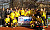 Gusties gather after defeating Fredonia at Calvin