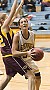 Junior Bri Monahan fights through a defender under the basket.
