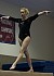 Laura Hansen performs on the balance beam.