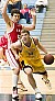 Phil Sowden drives the baseline.
