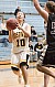 Senior Missy Mills drives through the lane for a lay-up.