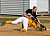 Julie Mahre attempts to tag out a Cobber runner.