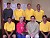 The Gustavus men's golf team with Barb Krig (wife of the late Bobby Krig) and their son Dave.
