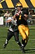 Senior wide receiver Kerry Zajicek makes the catch en route a record-tying 97-yard TD completion.