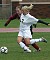 Alison Dittmer fights for position and the ball.