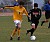Mike Butterworth battles a Wartburg defender for possession.