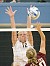 Senior captain Jen Thelemann goes up for a block against Hamline.