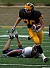 Cody Sukalski streaks past a Carleton defender on his way to a 60-yard touchdown reception.
