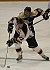 Tim Ornell pushes the puck up the ice.