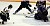 Patrick Dynan works to control the puck on his knees in front of the St. Thomas net. (Photo: Ryan Coleman, d3sports)