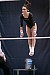 Kelly Mathewson performs on the uneven parallel bars.