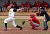 Shea Roehrkasse drives a ball to right field for a double in game one.