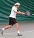 Nick Hansen rips a backhand in his doubles match.