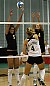Britta Bolm and Angela Ahrendt go up for the block against UW-La Crosse.
