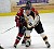 Casey Dynan fights for position in front of the net.