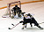 Kristin Peterson skates in on Bethel goaltender Beth Spurrier.
