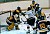 Gustavus pressures the Saints' goaltender in first period.