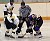 Melissa Mackley (#9) of Gustavus faces off with Jenna Daggit (#16) of UWSP