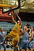 Ryan McPartland drives to the hoop for two of his 16 points.