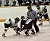 Whitney Schaff of Gustavus faces off with Amanda Gullickson of Augsburg.
