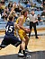 Sam Paulson posts up against a Carleton defender.