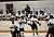 The Gustavus bench celebrates after Melissa Mackley's goal gave the Gusties a 5-0 lead in the third period.