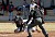 Andrew Woitas beats the throw in a play at the plate.