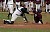 Augsburg's Craig Henry slides under the tag by Matt Morgan.