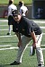 Coach Haugen intently watches the offense run a drill.