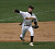 Trent Larson makes a throw to first base.