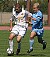 #11 Jordan Iblings holds off Johnnie defender.