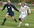 #22 Caleb Bousu is defended by Bethel defender #18 Scott Hamlin.