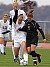 Megan Tepper holds off a Piper defender