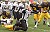 Defensive end Jerry Millan sacks St. Olaf quarterback Jason Wilsey