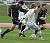 Gustavus midfielder #6 J.T. Johnson scores the first goal in the 29th minte.