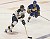 Gustavus defender #20 Jon Keseley gets past the St. Scholastica defender.