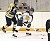 #16 Steven Jensen keeps the puck away from the Yellow Jacket defender.