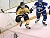 Gustie forward Ben Ollila and Sabre defenseman Ken McKay get tangled up along the boards.