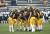The offense huddles before a play in last week's game against Carleton in St. Peter