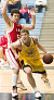 Phil Sowden drives the baseline.