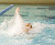Scott Hagemeyer set a new pool record in the 100 backstroke.